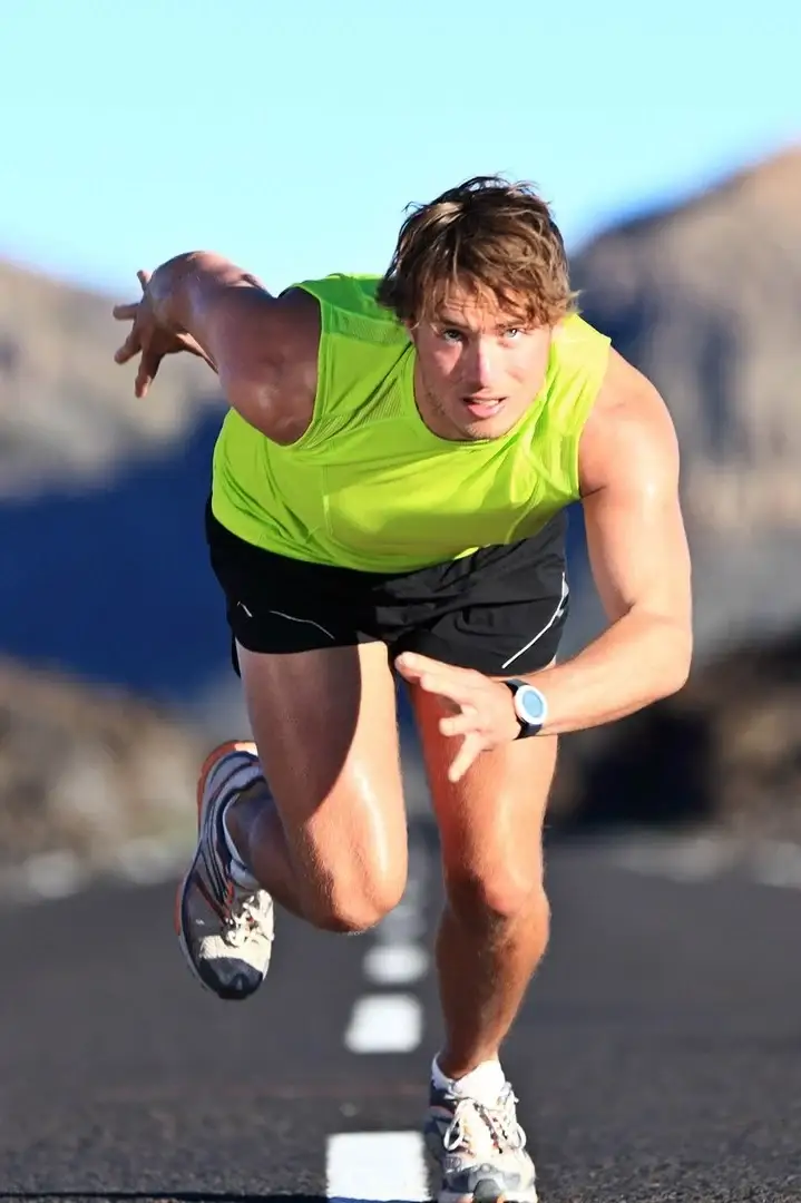 Men sports running on the gound
